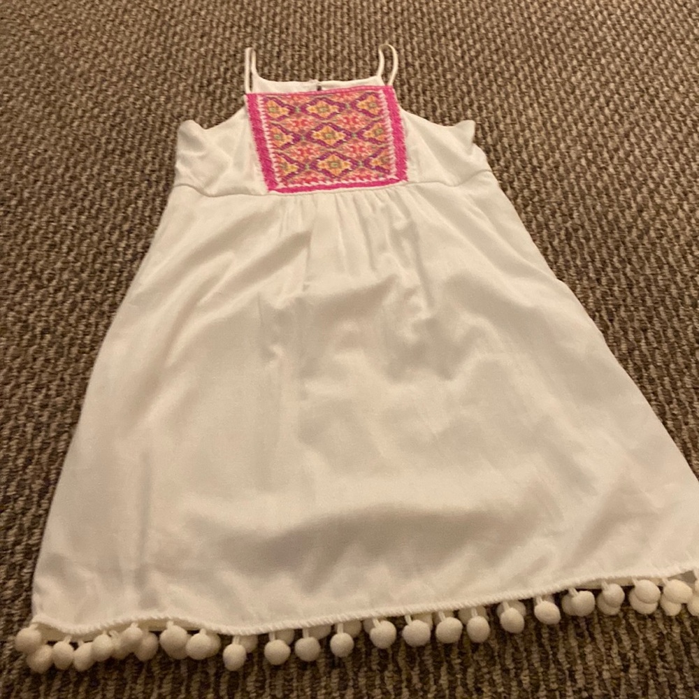 white dress with a pop of color